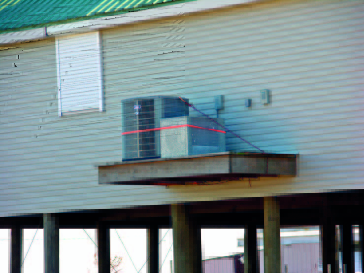 Flood protected HVAC equipment Proper elevation ofan air‑conditioningcondenser in afloodprone area;additional anchorage isrecommended