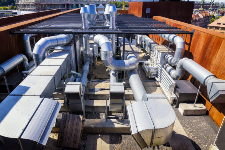 A commercial HVAC system on the roof of an office building